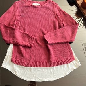 Loft sweater with shirt tail layer accent.